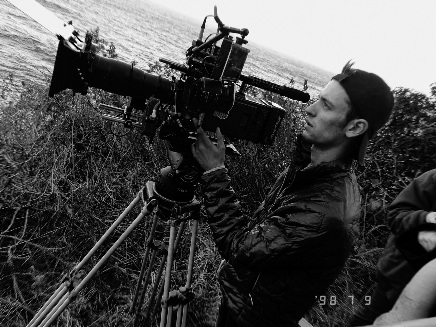 Alexander Bonelli operating a cinema camera on location.